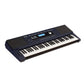 Roland E-X30 Portable Keyboard with Battery Operation: The Roland E-X30 keyboard set up on a table, emphasizing its lightweight design and battery-powered functionality for music-making on the go.